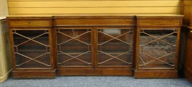19TH CENTURY MAHOGANY LIBRARY LOW BOOKCASE, of inverted breakfront outline, with frieze drawers