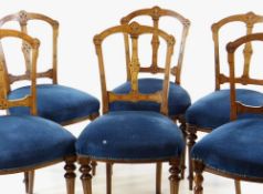 SET OF SIX LATE VICTORIAN WALNUT DINING CHAIRS, with engraved open backs, shaped stuffover seats