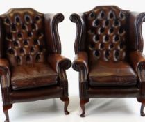 PAIR GEORGIAN-STYLE BROWN LEATHER WINGBACK ARMCHAIRS, by Whittle Bros. of Warrington, button-
