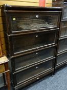 DARK STAINED GLOBE WERNICKE FOUR-TIER BOOKCASE, transfer printed label, 87 x 26 x 136cms