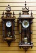 TWO DECORATIVE GERMAN VIENNA-STYLE WALL CLOCKS, one stained pen work floral case, two part roman