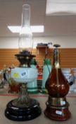 EDWARDIAN BRASS & VASELINE GLASS OIL LAMP and a copper clad brown glass flask (2)