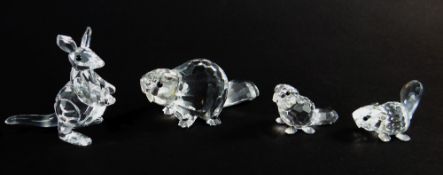 FOUR SWAROVSKI CRYSTAL MODELS OF ENDANGERED SPECIES, comprising mother beaver, baby beaver lying,
