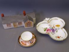 A MINIATURE ROYAL CROWN DERBY CUP & SAUCER, each piece Numbered 7112 with green stamp, Royal Crown