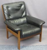 MID-CENTURY TEAK FRAMED ARMCHAIR, upholstered in black with button and stitch detail bearing 'Pelham
