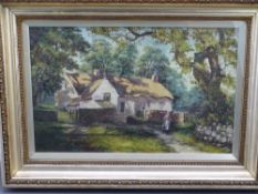 EDWARDIAN OIL ON CANVAS - a cottage with figure, 34 x 54cms