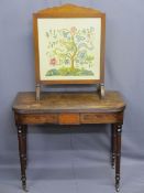 REGENCY FOLDOVER TEA TABLE IN MAHOGANY on turned supports with pot castors (slight restoration