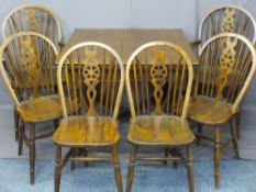 OAK DRAWER LEAF TABLE on twist supports, 75cms H, 92cms W, 92cms D closed and six wheelback