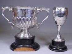 HALLMARKED TROPHY CUPS (2) London 1910 by Thomas Bradbury & Sons Ltd having twin-scroll end