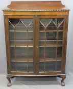 VINTAGE MAHOGANY TWO-DOOR DISPLAY CABINET on ball and claw feet, 126cms max H, 91cms W, 35cms D