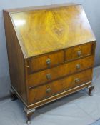 WALNUT CROSSBANDED WRITING BUREAU with a two over two drawer configuration, fitted interior on