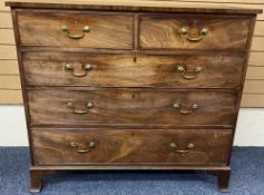 GEORGIAN MAHOGANY CHEST of two short over three long drawers, oak lined with cock beaded edging