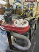 DeWALT DW720 CROSS CUTTING SAW ON A METAL STAND and a Makita Mitre saw and a large capacity dust