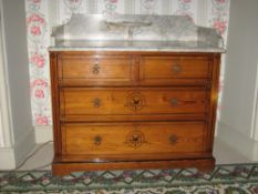 AN EDWARDIAN PINE WASHSTAND with white marble back and side rail top with small oval half-moon shelf