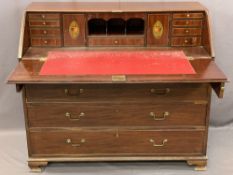 GEORGE IV MAHOGANY FALL FRONT BUREAU having a well fitted interior of central pigeonholes with
