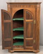 REGENCY MAHOGANY TWO DOOR WALL HANGING CORNER CUPBOARD, the twin arched six panel doors with brass H