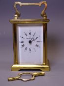 VINTAGE BRASS CASED CARRIAGE CLOCK WITH KEY, the dial marked 'Boodle & Dunthorne', 14.5cms H