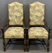 VINTAGE OAK COTTAGE STYLE ARMCHAIRS having animal adorned tapestry covers to the seats and backs,