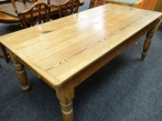 VICTORIAN PINE KITCHEN TABLE, with boarded top and cleated ends, turned legs, 186 x 90cms