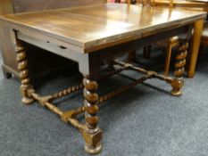 JACOBEAN-STYLE OAK DRAW LEAF DINING TABLE, barley-twist legs and double stretchers, bun feet, 212cms