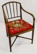 REGENCY PAINTED FAUX-BAMBOO ARMCHAIR, bar splat and downswept arms, needlework tapering seat, on
