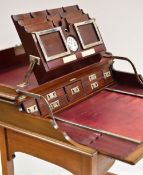 FINE EDWARDIAN MAHOGANY 'CAMPAIGN-TRAVEL' DESK, c.1910, plain hinged top opening to reveal a