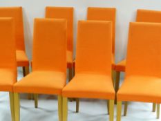 DIDIER GOMEZ FOR LIGNE-ROSET: SET OF EIGHT DINING CHAIRS, upholstered in orange fabric (
