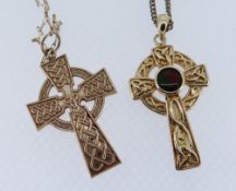 TWO SIMILAR CELTIC GOLD CROSS PENDANTS comprising 9ct example on chain together with 14K example