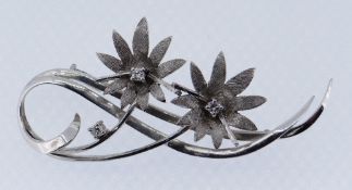 WHITE METAL DIAMOND SET FLORAL BROOCH, 7.9gms Condition Report: Hallmarks rubbed. Appears in good