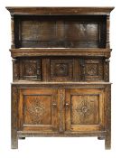 EARLY EIGHTEENTH CENTURY & LATER SNOWDONIA CWPWRDD TRIDARN in carved oak, having an open canopy,