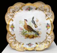 A NANTGARW PORCELAIN SQUARE DISH FROM THE MACKINTOSH SERVICE having a shaped rim, painted in London,