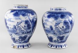 NEAR PAIR OF 18TH CENTURY DELFT BLUE & WHITE JARS, c. 1750, probably English, painted with two large