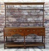 18TH CENTURY WELSH OAK HIGH DRESSER, probably Swansea Valley, open delft rack with wrought iron