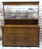 18TH CENTURY NORTH WALES OAK DRESSER, open delft rack above base fitted with six drawers and two