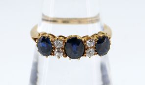 18CT GOLD SAPPHIRE & DIAMOND RING, the three sapphires separated by two pairs of diamonds, claw set,