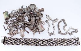 ASSORTED SILVER JEWELLERY comprising charm bracelet with multiple and various charms, chunky