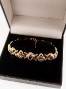 YELLOW METAL AMETHYST SET LADIES BRACELET, 13.4gms, in black jewellery box