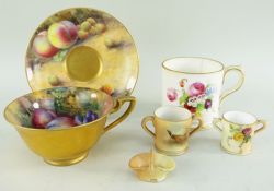 COLLECTION ROYAL WORCESTER PORCELAIN, comprising a fruit-painted teacup by Horace Price with gilt