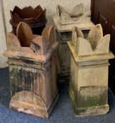 FOUR VARIOUS VINTAGE CHIMNEY POTS all having crown form tops, 76.5cms H the tallest