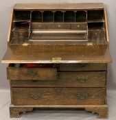 ANTIQUE OAK FALL FRONT BUREAU with interior slide well and good arrangement of drawers and