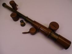VINTAGE BRASS & LEATHERBOUND TELESCOPE inscribed 'Reconditioned for John Barker & Co Ltd, Kensington