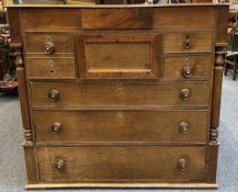 19TH CENTURY OAK CHEST OF 8 DRAWERS, the moulded edge top over a secret central frieze drawer,