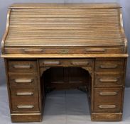 VINTAGE OAK ROLLTOP DESK, the tambour front opening to reveal a fitted interior of pigeonholes and