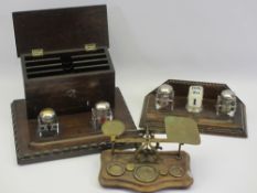 VINTAGE OAK DESK STANDS (2) and a set of postal scales, both stands have twin lidded ink bottles,