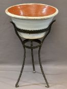 VICTORIAN POTTERY EGG CROCK/MILK PAN on a cast iron tripod stand, 87cms H, 53cms diameter