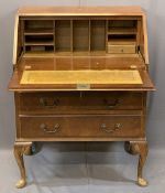 VINTAGE BURR WALNUT FALL-FRONT BUREAU with interior drawers and pigeonholes over three drawers on
