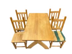 MODERN LIGHT OAK DINING TABLE & FOUR CHAIRS, the rectangular top on X frame supports, 76cms H,