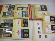 STAMPS - unmounted mint presentation packs within two binders