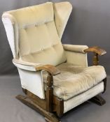 VINTAGE STYLE OAK FRAMED ROCKING WING-BACK ARMCHAIR with button upholstery, 87.5cms H, 64cms W,