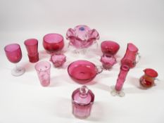 CRANBERRY & RUBY GLASSWARE, A COLLECTION - 13 pieces to include footed bowls, stem vase, enamel